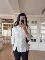 Shirt with buttons detail
